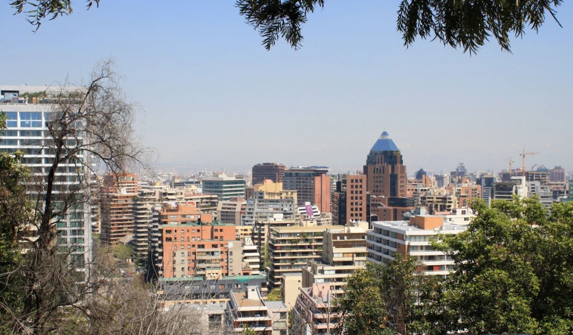 an aerial view of some buildings with a sky scr