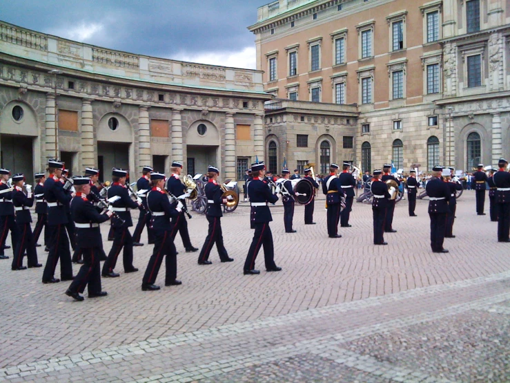 a group of people that are standing in the street