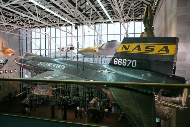 a display of aircraft on display in a museum