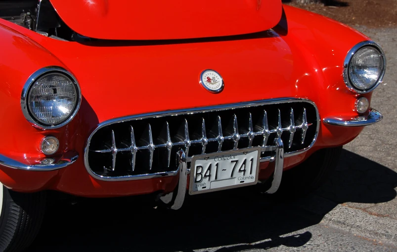 the classic car has an emblem on it