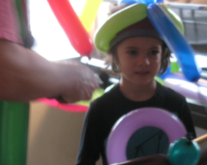 a  with a big colorful hat