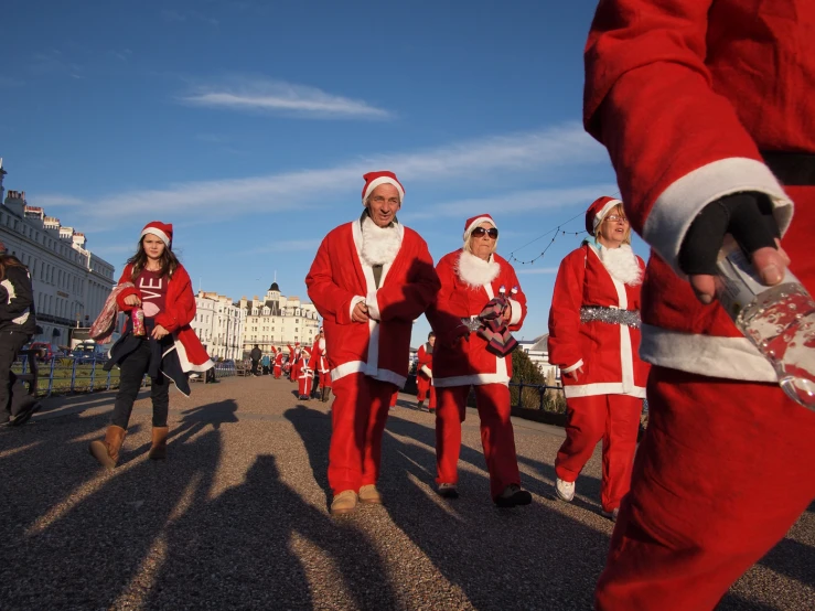 a group of people that are dressed as santa