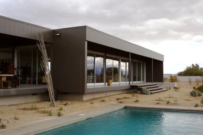 a swimming pool with a ladder to the side