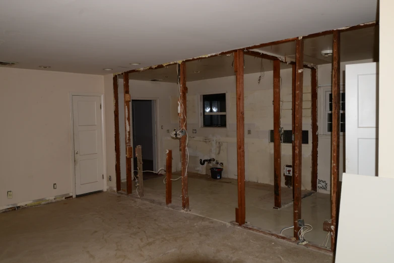 view of an unfinished bathroom with several framing