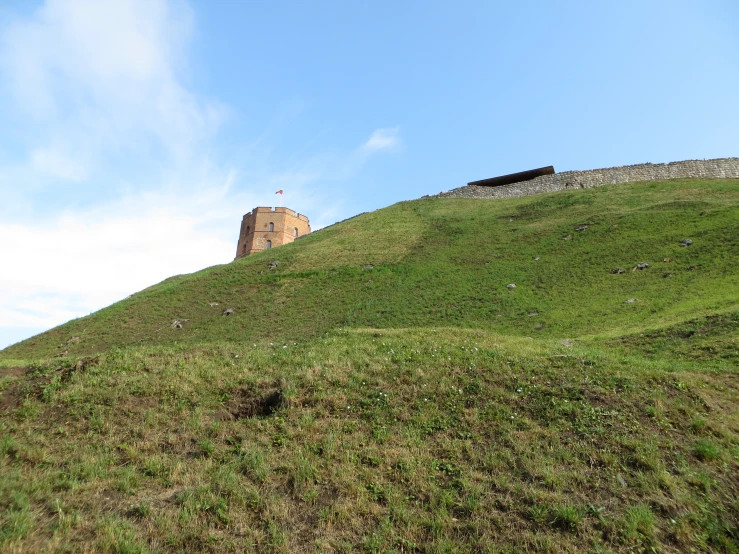 a stone structure sitting on top of a hill