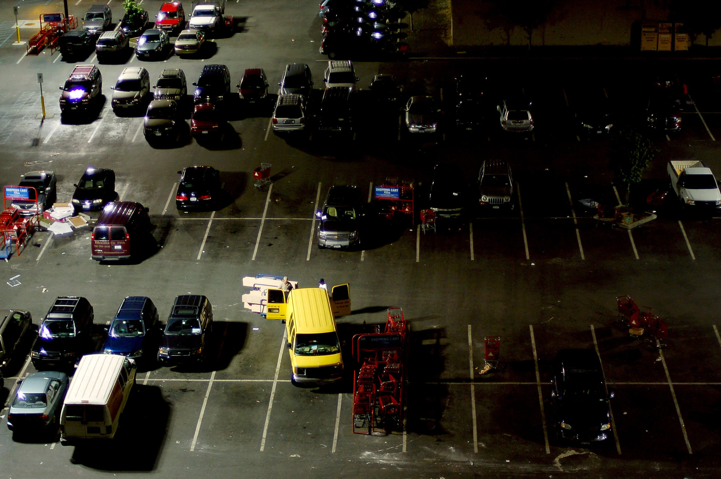 a parking lot that has many cars parked in it