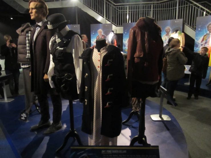 a number of clothes on display at a convention