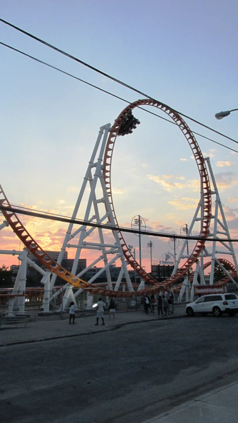 a roller coaster against a blue sky at the amut park