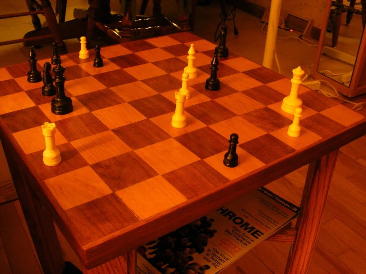 a checkered board with black chess pieces