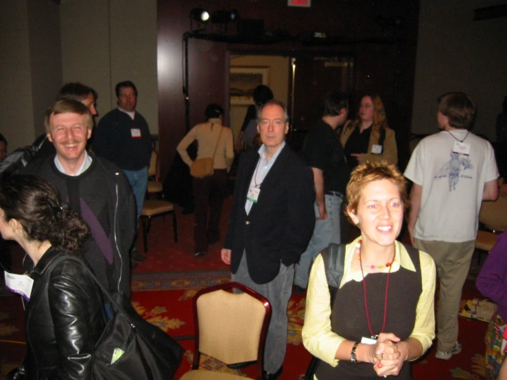 a group of people gathering in a room