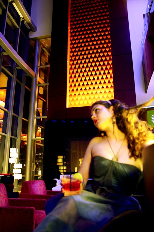 the woman sits and waits in a restaurant