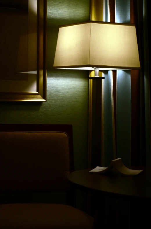 a room with a lamp and a table