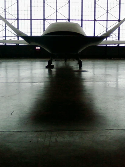 a plane that is sitting in a hangar