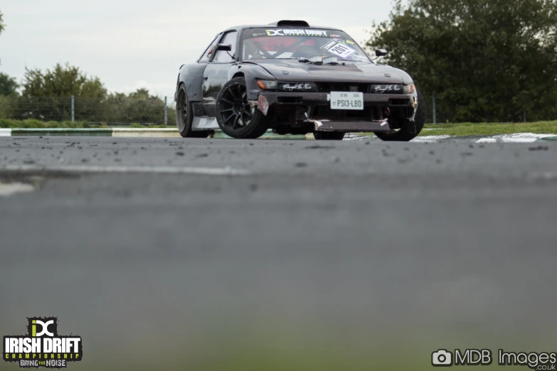 a gray nissan 240 zr1 in a corner