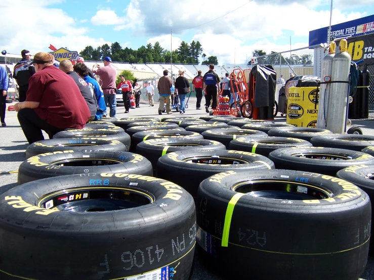 rows of large tires lined up on the ground