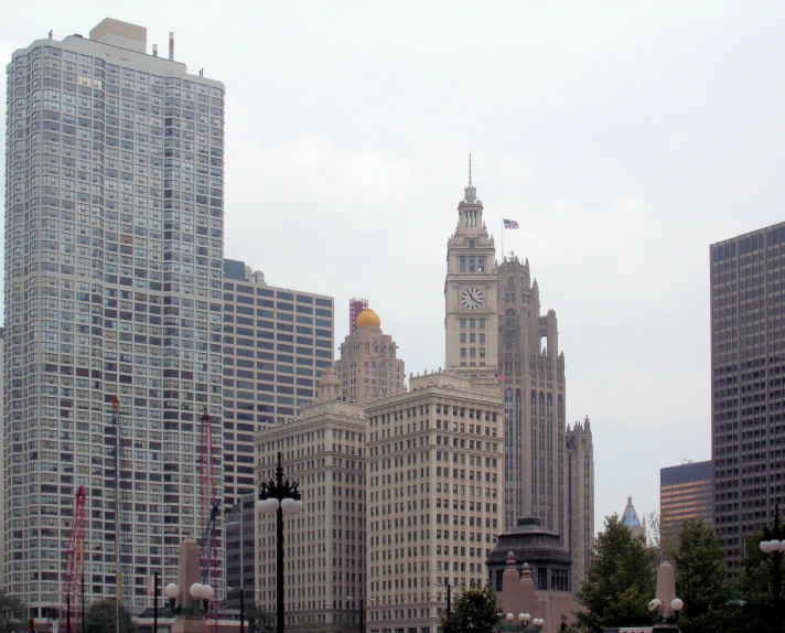 several tall skyscrs in the middle of a city