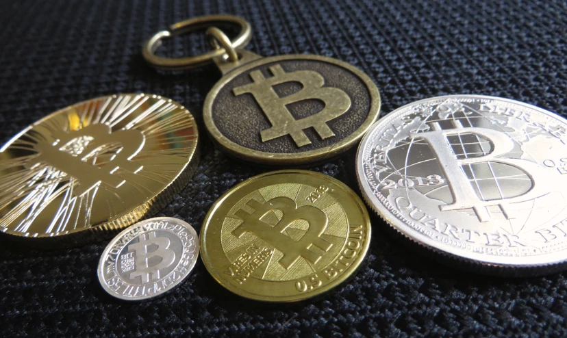 three different bitcoins that have been placed next to each other