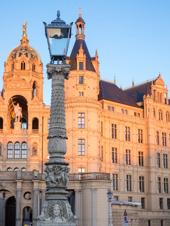 a large building with an ornate front and side face