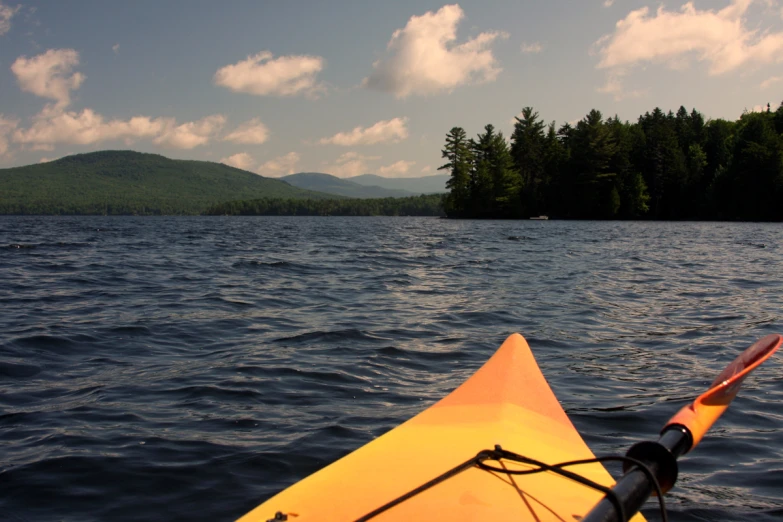 a kayak in the middle of a lake