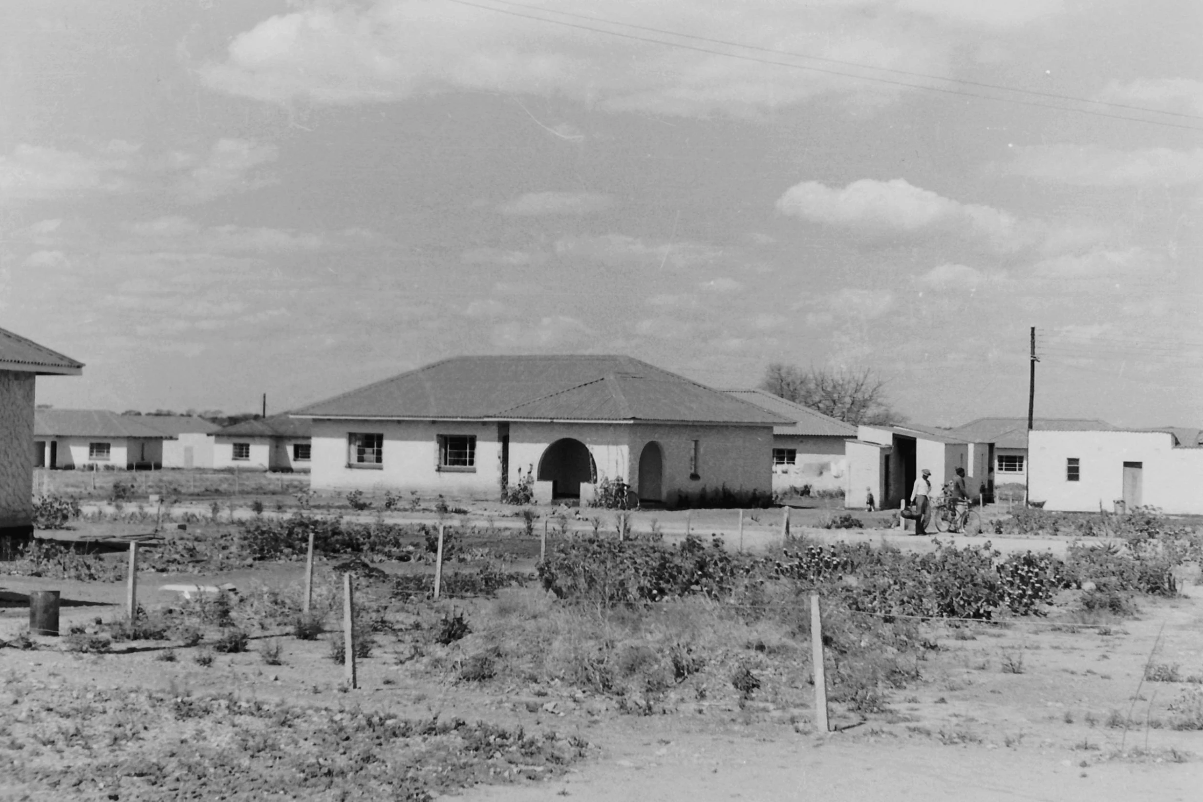 a black and white po of the back side of a house