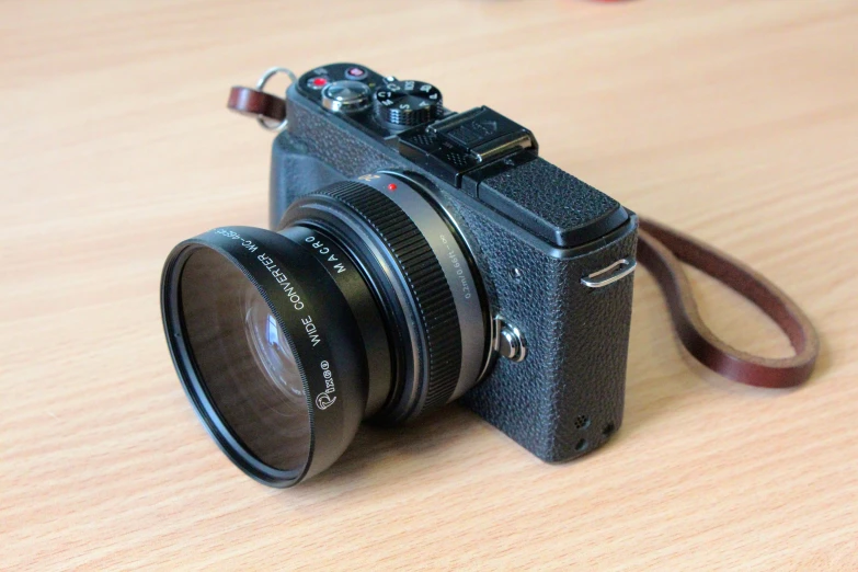 an old fashioned camera with the lens pointed up