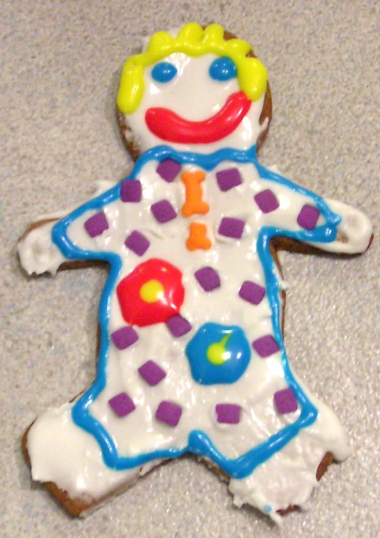 a ceramic decoration of a child's colorful polka dot costume