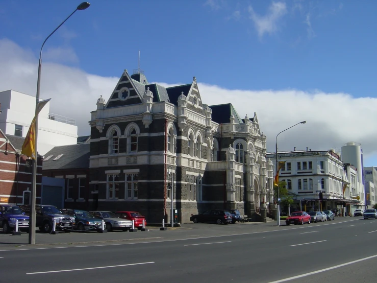 a large building sitting on the side of a road