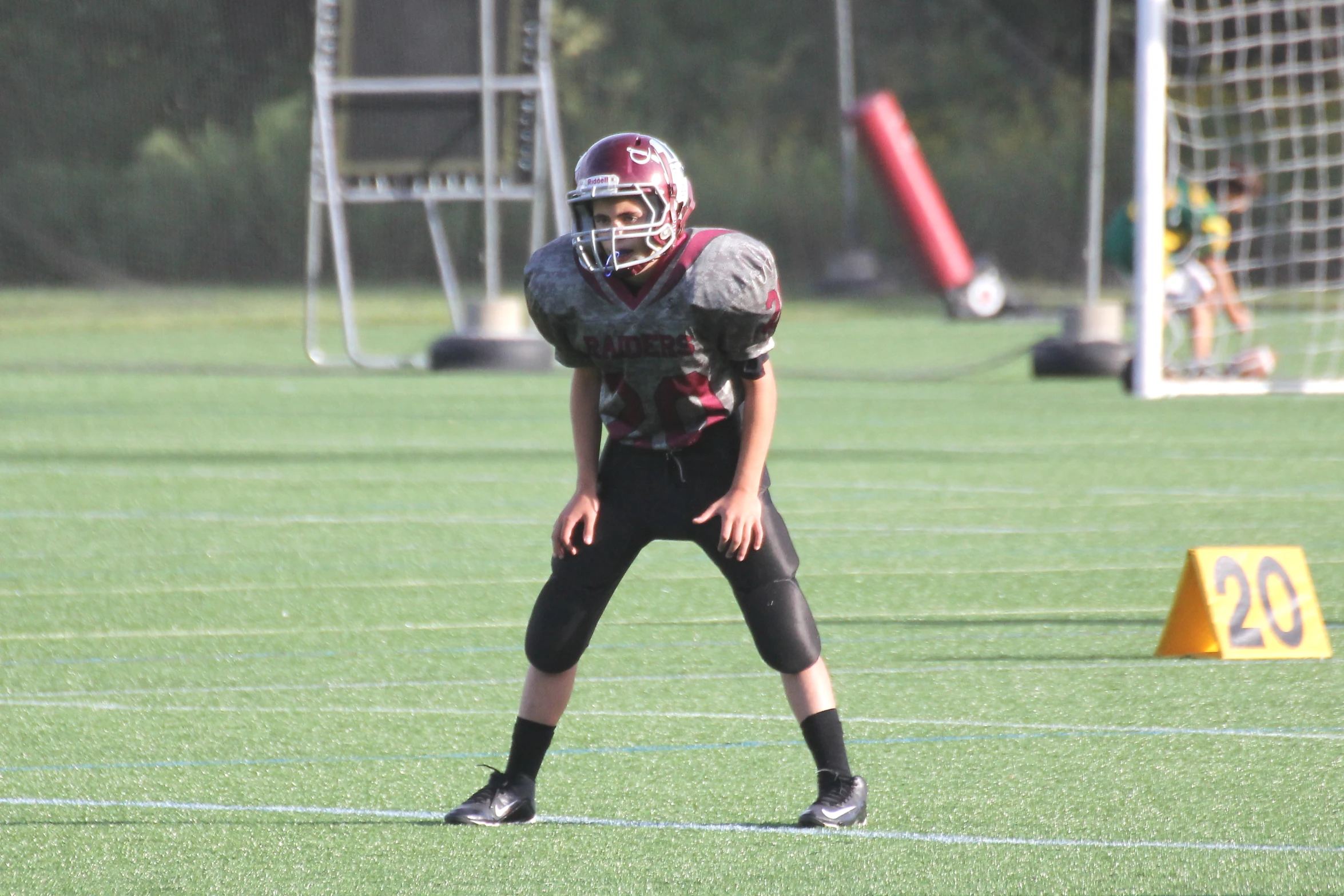 a youth football player in the middle of training