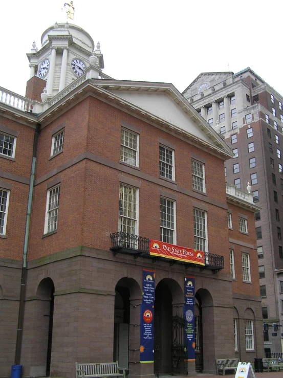 a tall building with a large clock at the top of it