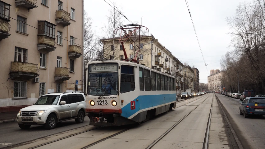 a bus and some cars on a city street