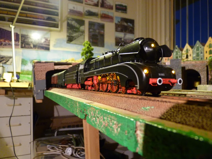 a toy train on a table in a play room