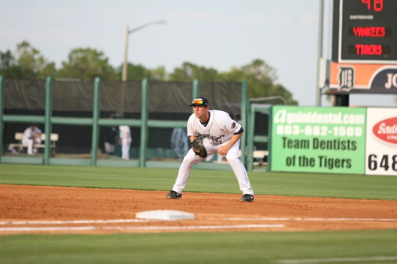 a baseball player catching the ball during a game