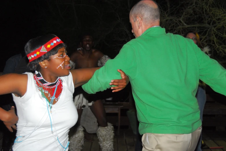 two people dance a number at a party