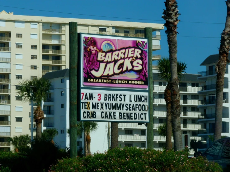 an advertit for a hair salon outside in front of a city