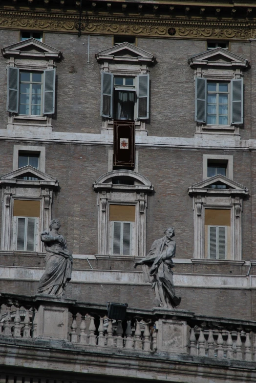 a clock sitting on top of a stone building