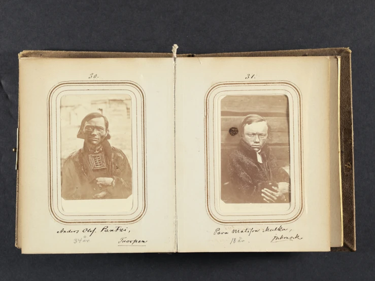 an old book with two men dressed in early american garb