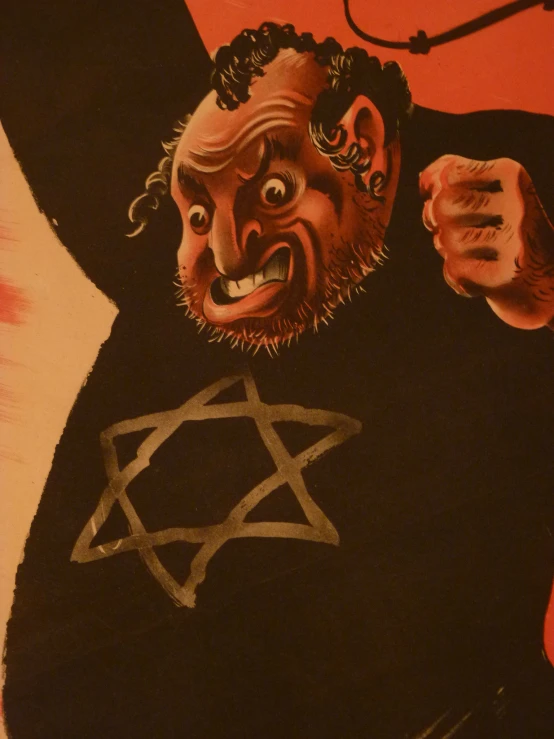an angry jewish man holds his fists out