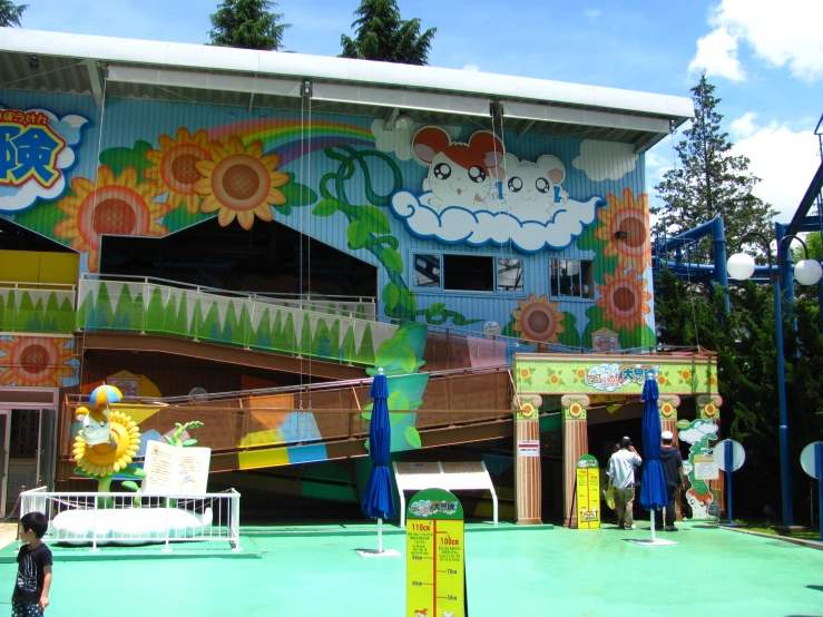 an amut park, with a large painting on the building