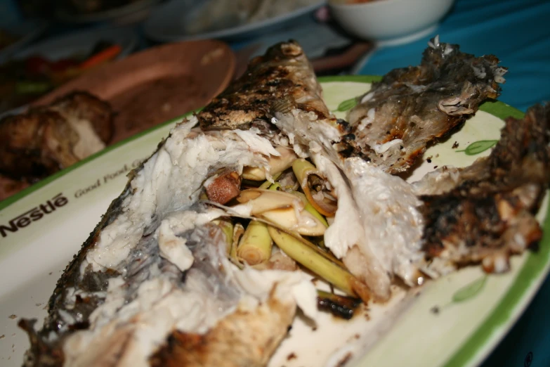 a white plate with food on it next to other foods