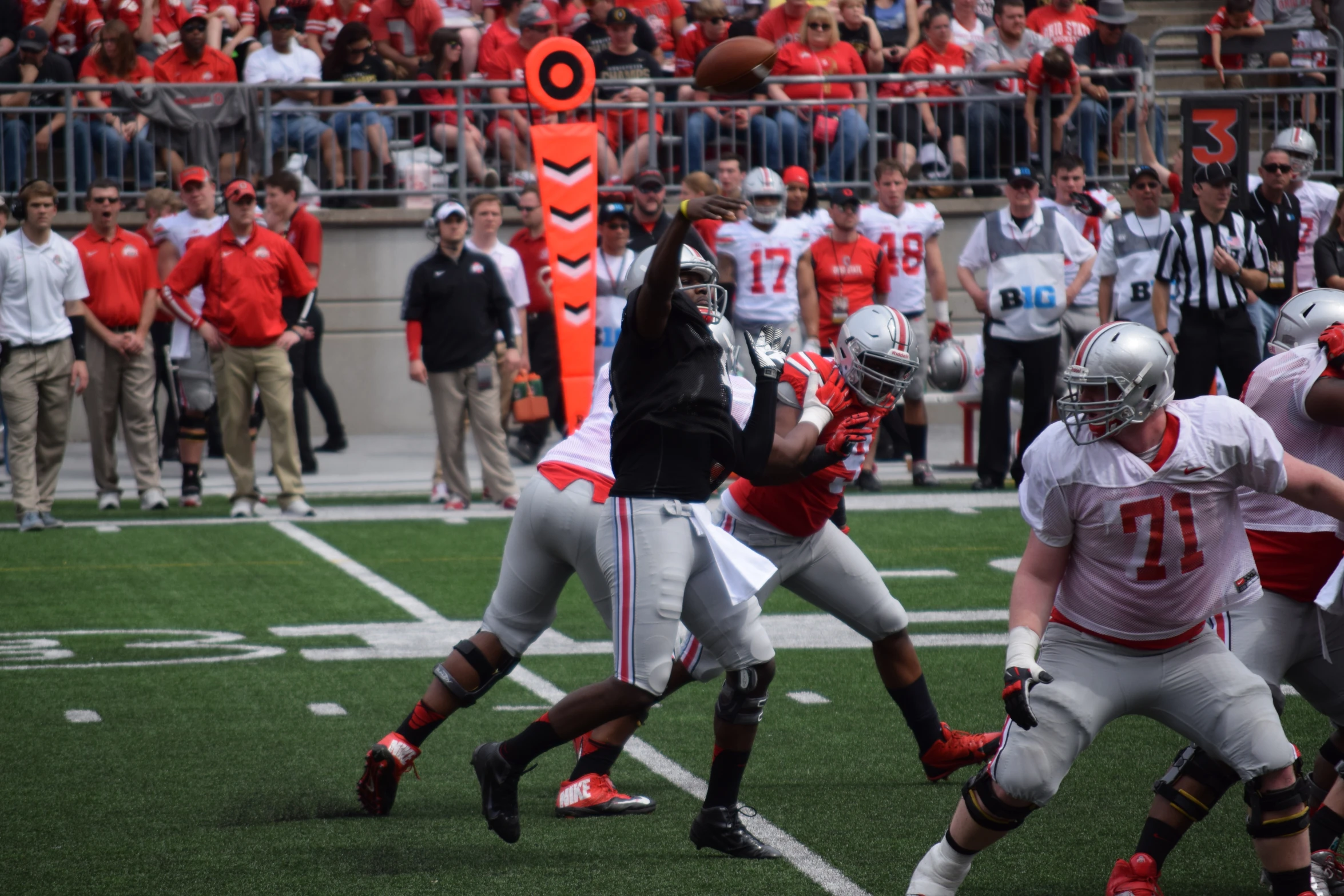 a football game with the opposing players playing on the field