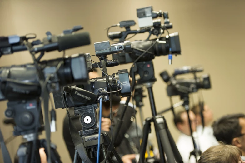 there are many cameras being shown in a group