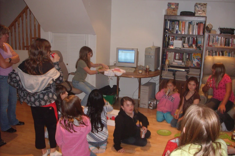 a group of children are playing video games