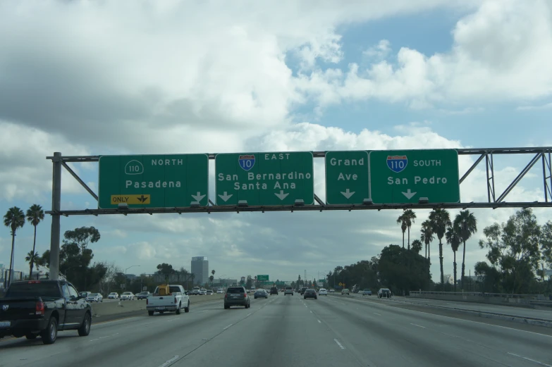 cars going in two directions on an interstate