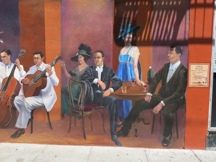 painting of people with hats and instruments on side wall