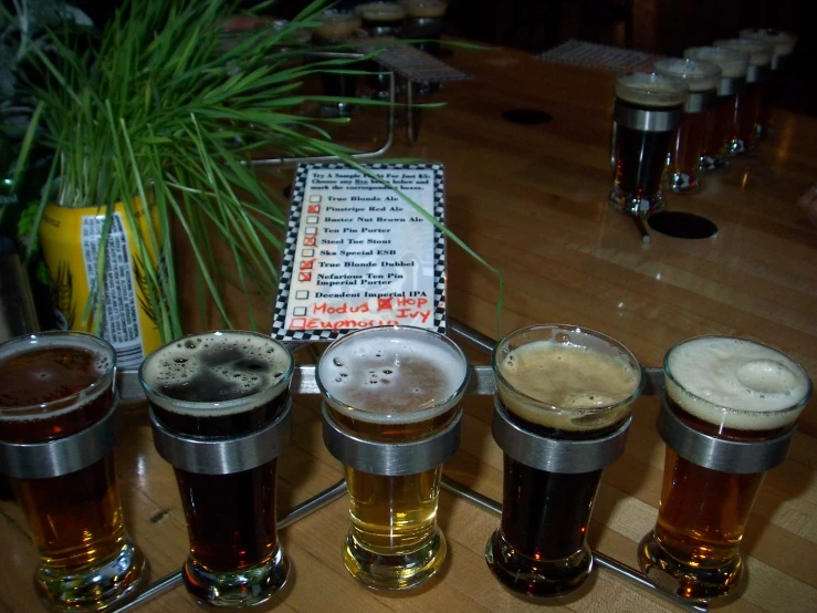 several different kinds of beer on a table
