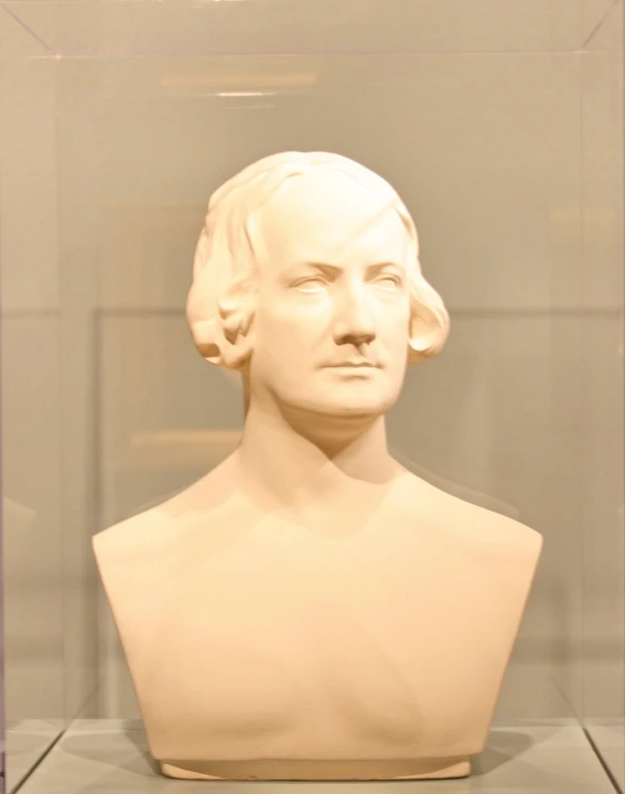 a bust of a man with short hair