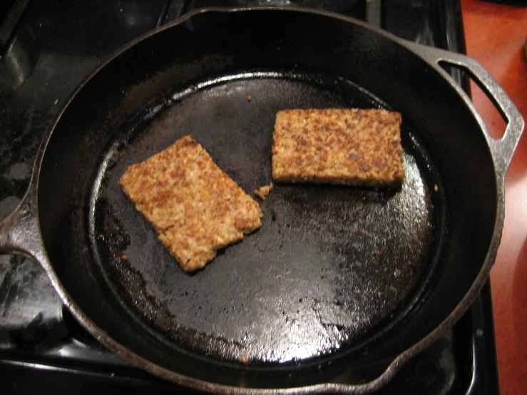 a frying pan with some tofu in it