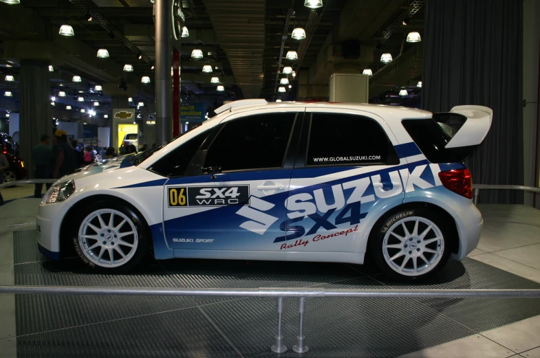 a vehicle is parked on display at a show