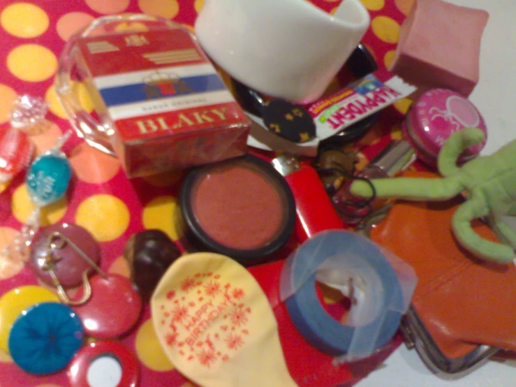 a table covered with condiments and toys