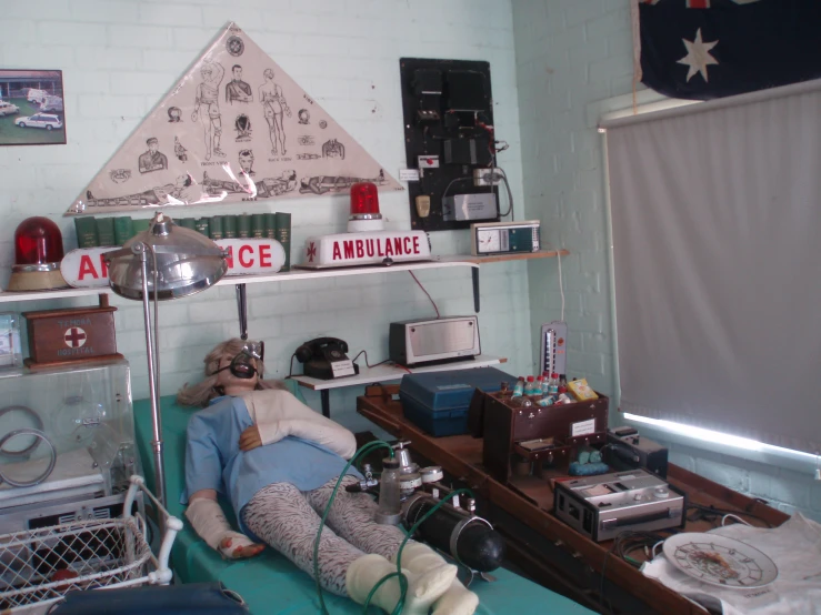 a woman lies down on the floor in an office